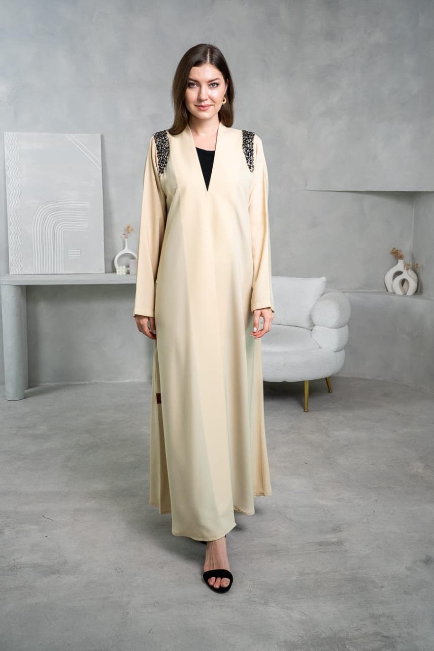 Beige abaya with crystal black stones